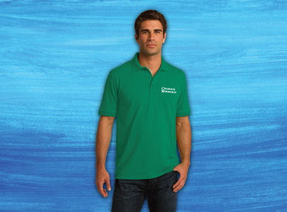 Man wearing green, cotton, collared polo shirt embroidered with Colorado Workforce logo on chest