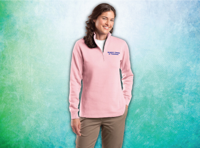Woman wearing Pink, Zippered, Warm and Cozy Sweatshirt screen printed with Women’s Center of Colorado logo